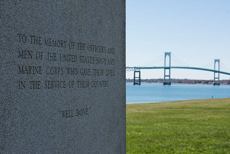 U.S. Naval War College plague with the Pell Bridge in the background.