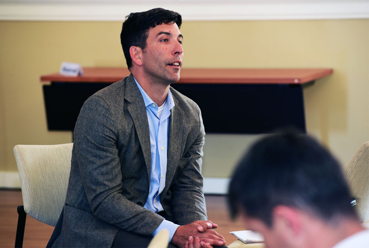 Photo of Craig Whiteside, professor of national security affairs in the U.S. Naval War College Monterey Program, speaks about the most recent national security strategy with foreign area officers in language training at the Defense Language Institute Foreign Language Center.