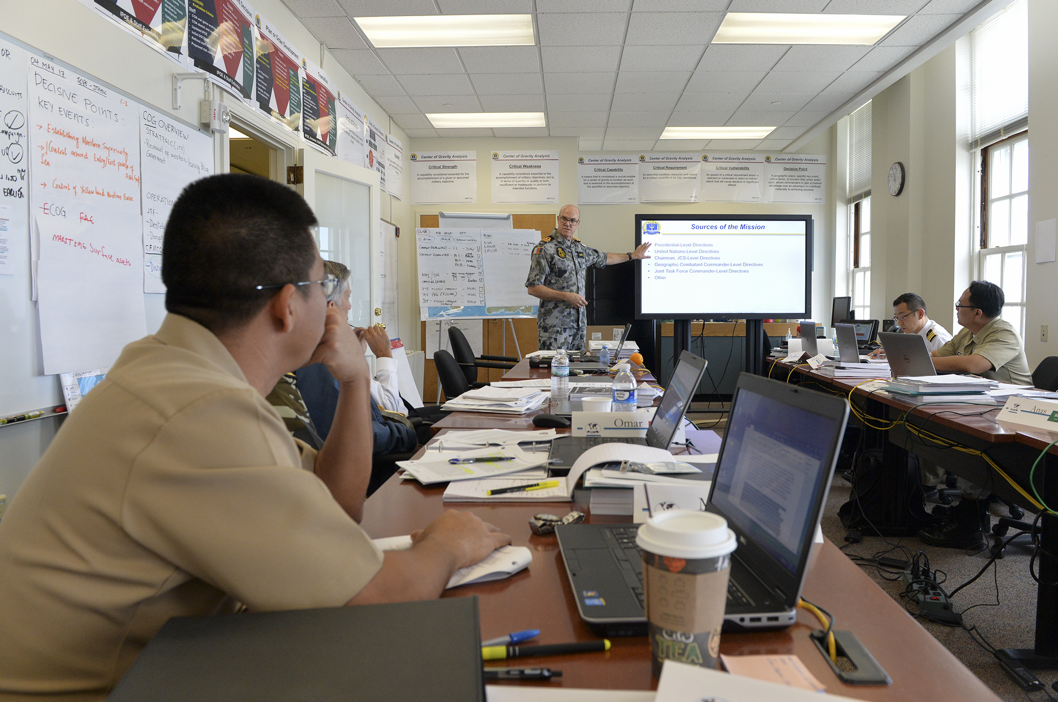 Students prepare a presentation for the newly designed International Maritime Staff Operators Course (I-MSOC) at U.S. Naval War College, Newport, Rhode Island.