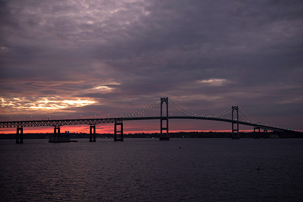 Sunset behind the Newport, Rhode Island Pell Bridge.