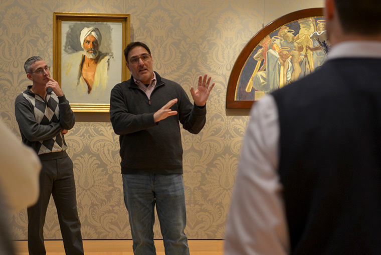 Lt. Col. Terry Brannan, left, listens as Tom Culora, dean of the Center for Naval Warfare Studies, discusses paintings during a Jan. 16 tour of the Boston Museum of Fine Arts.