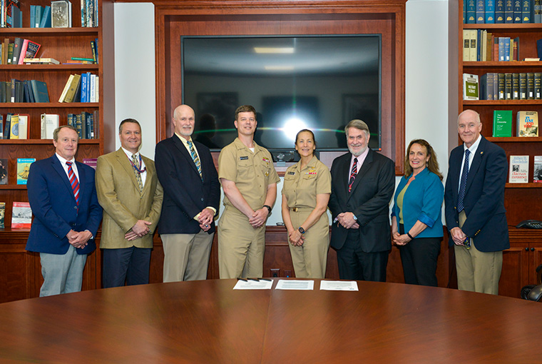 Participants in the first class of the NAVSEA Dr. William F. Bundy Warfare Center Scholar Program include Chris Kona of the Naval Undersea Warfare Center Division Newport; Emily Hester of Naval Surface Warfare Center (NSWC) Dahlgren Division; D. Max Jones of NSWC Carderock Division; and Mary Westlake and Jamie Jones both from NSWC Port Hueneme Division.