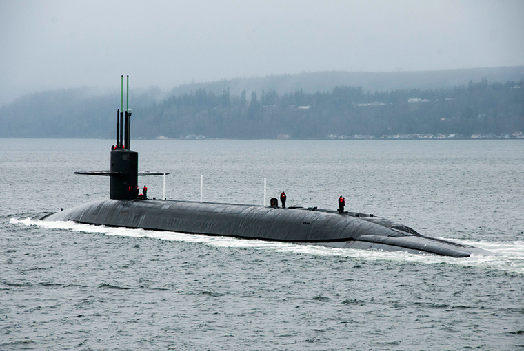 The Gold Crew of the Ohio-class ballistic-missile submarine USS Henry M. Jackson (SSBN 730) transits the Hood Canal as the boat returns home to Naval Base Kitsap-Bangor following a routine strategic deterrent patrol.