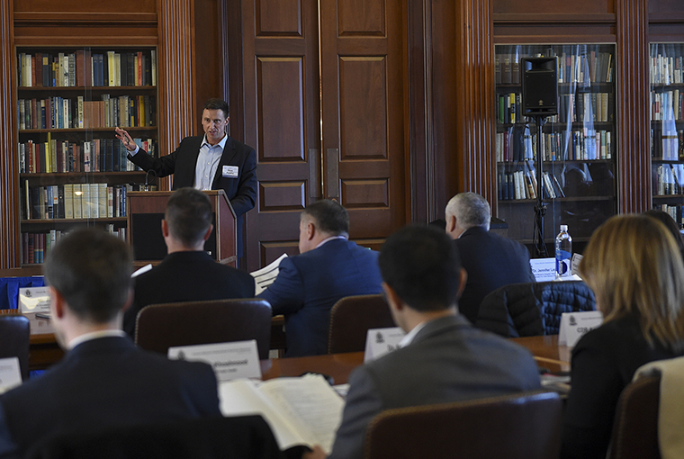 Dave Polatty, associate professor, U.S. Naval War College (NWC) College of Operational and Strategic Leadership and Operational Level Programs, provides remarks during the Civilian-Military Humanitarian Response Workshop held at NWC in Newport, Rhode Island.