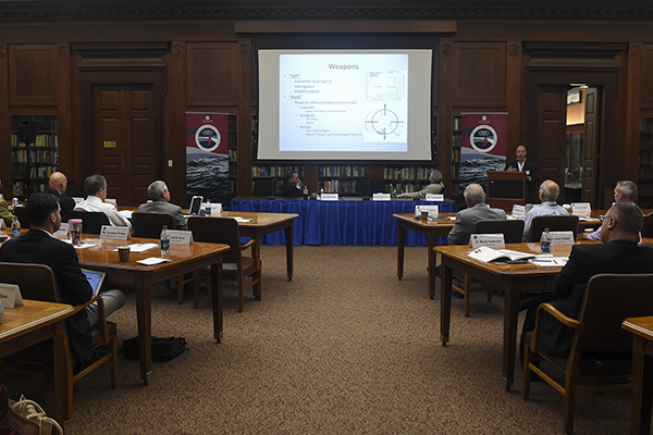 James Giordano, Georgetown University, Washington, D.C. gives a presentation at a symposium hosted by the Center for Irregular Warfare and Armed Groups (CIWAG) at the school in Newport, Rhode Island. 
