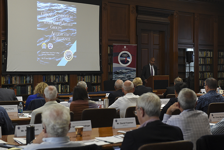 Andrew F. Knaggs, deputy assistant secretary of defense for special operation and combating terrorism, addresses a symposium hosted by the Center for Irregular Warfare and Armed Groups (CIWAG) at U.S. Naval War College (NWC). 