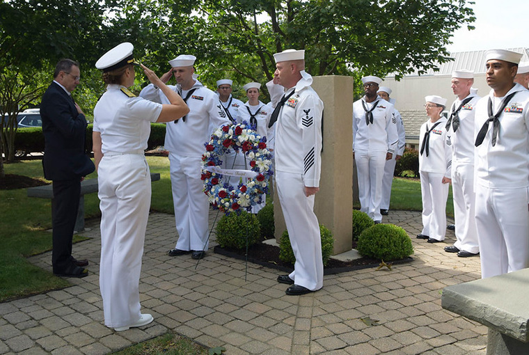 Rear Adm. Shoshana S. Chatfield, president, U.S. Naval War College pays respect during a ceremony to commemorate the 18th anniversary of the 9/11 attacks.