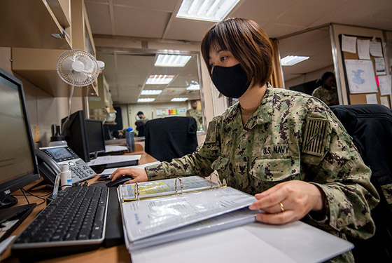 Logistics Specialist 3rd Class Jie Du, from Columbus, Ohio, works in the supply office aboard the hospital ship USNS Mercy (T-AH 19).