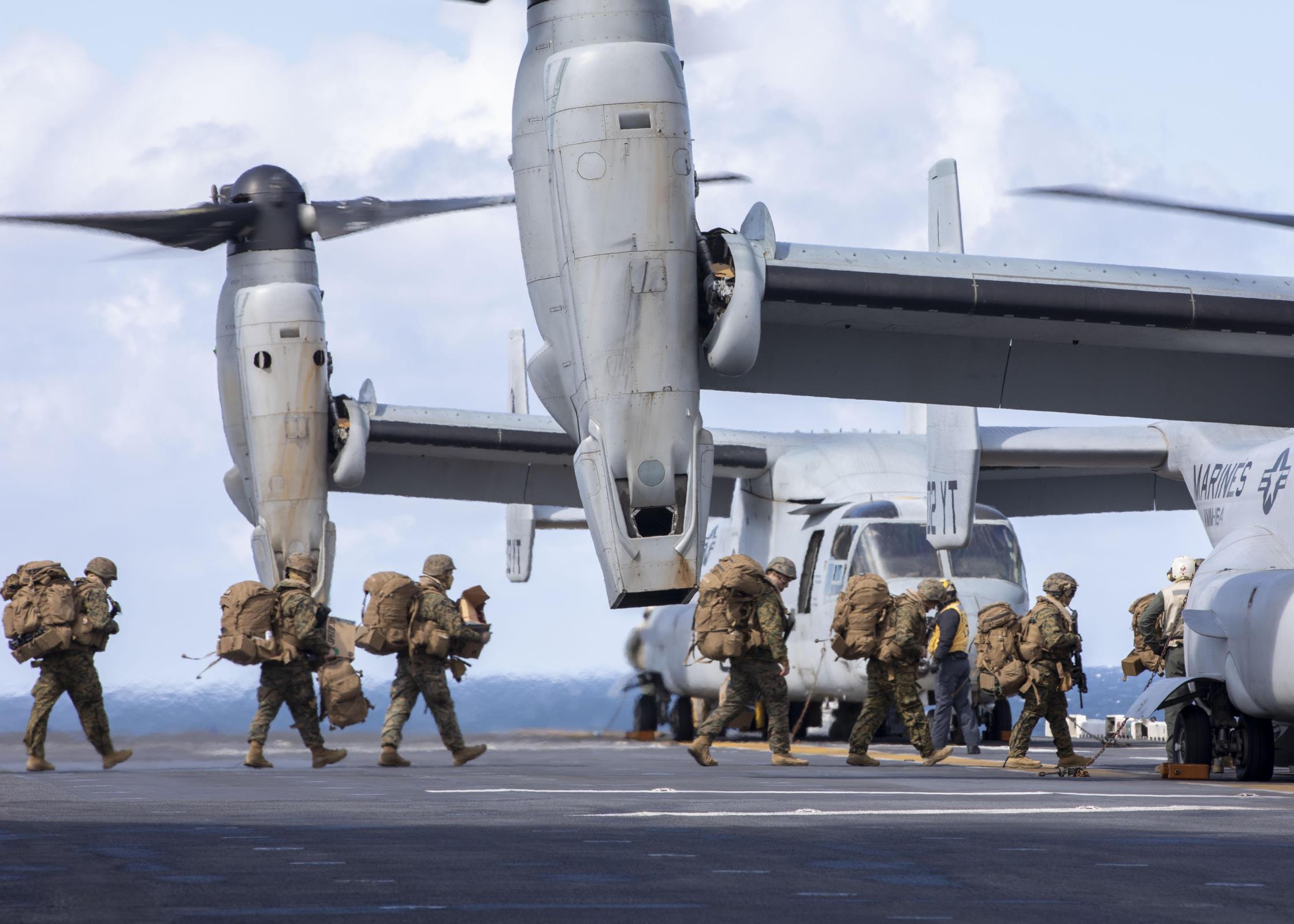 PACIFIC OCEAN (May 3, 2021) U.S. Marines assigned to the 15th Marine Expeditionary Unit board an MV-22 Osprey assigned to Marine Medium Tiltrotor Squadron 164 (Reinforced), 15th MEU, aboard the amphibious assault ship USS Makin Island (LHD 8) in the north Pacific Ocean during Northern Edge 2021. (U.S. Navy photo by Mass Communication Specialist 2nd Class Michael J. Lieberknecht) 210503-N-AO823-1008