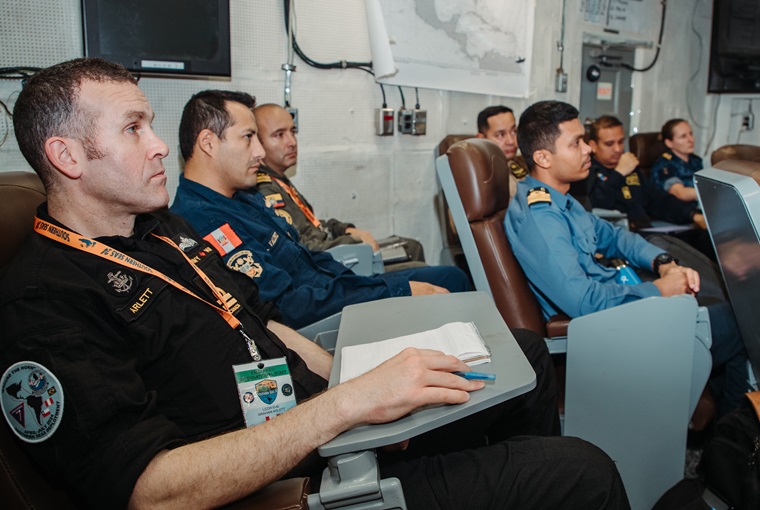 U.S. Naval War College faculty and staff leveraged their knowledge and expertise to educate embarked international and U.S. Navy personnel in operational planning aboard the aircraft carrier USS George Washington (CVN 73), April 29 – May 5.