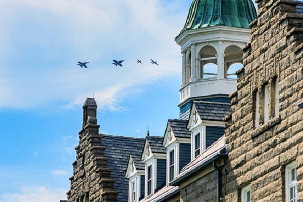 F/A-18 Hornets assigned to Strike Fighter Squadron (VFA) 106 out of Naval Air Station Oceana, Va., conduct a flyover in Newport, Rhode Island.