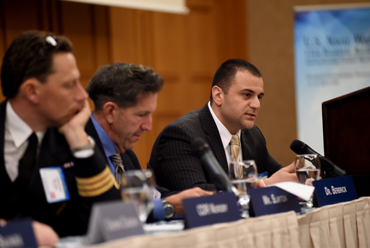 Walter A. Berbrick, director of U.S. Naval War College's (NWC) Arctic Regional Studies Group in Newport, Rhode Island, moderates a panel discussion on the drivers of conflict and cooperation in the Arctic Region at NWC's 13th Regional Alumni Symposium in Garmisch-Partenkirchen, Germany. 