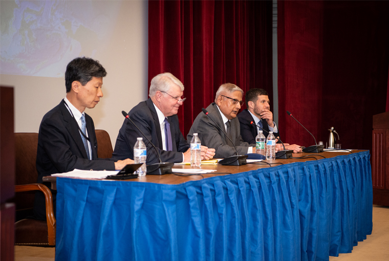 Photo of three retired and former heads of navy, Adm. Gary Roughead, Indian navy Adm. Nirmal Verma, and Japan Maritime Self-Defense Force Adm. Tomohisa Takei, participating in a trilateral discussion on the South China Sea at U.S. Naval War College.