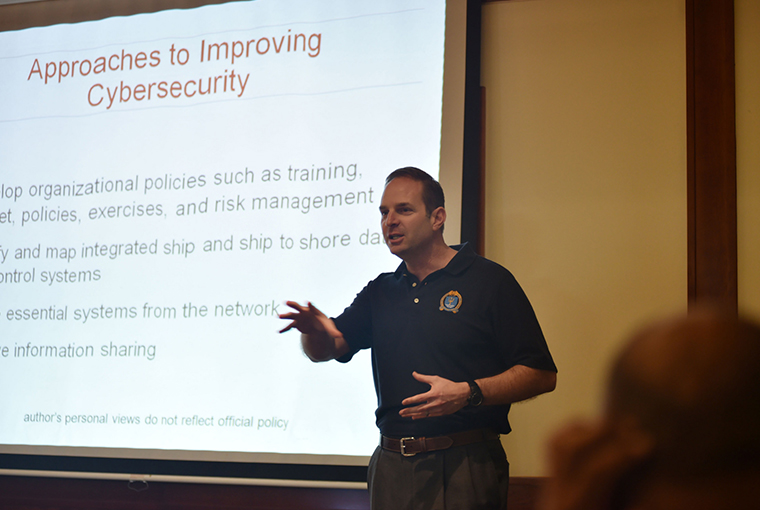Prof. Derek Reveron, assigned to U.S. Naval War College, speaks about different approaches to improving cybersecurity at a Senior Leaders Seminar during Exercise Cutlass Express 2017 in Pointe Aux Piments, Mauritius. 