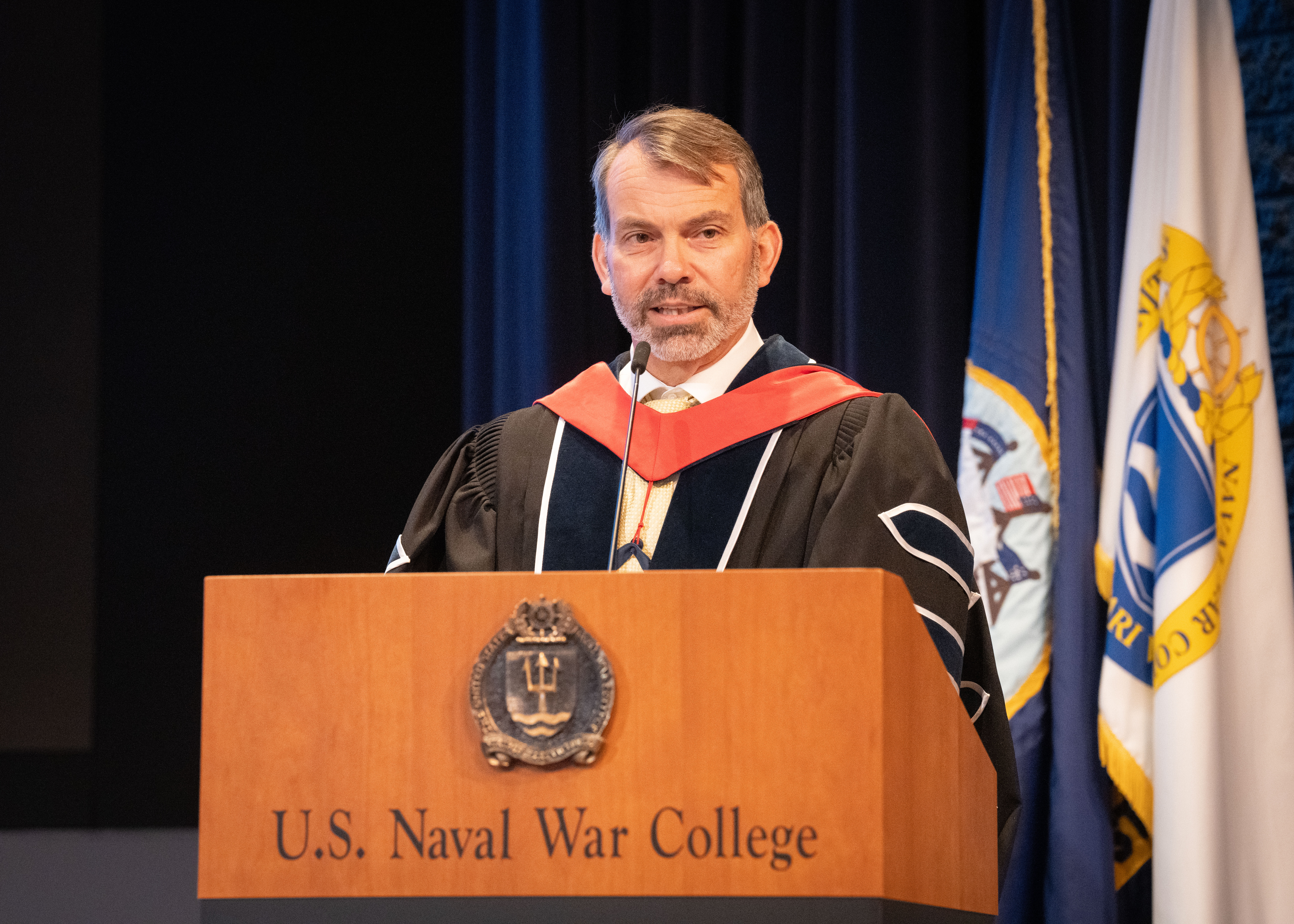 The U.S. Naval War College holds a commencement ceremony for students from the College of Naval Command and Staff and the College of Naval Warfare on board Naval Station Newport, November 15, 2023. NWC Provost Dr. Stephen Mariano presided over the ceremony and Strategy and Policy Professor Josh Hammond served as the keynote speaker.