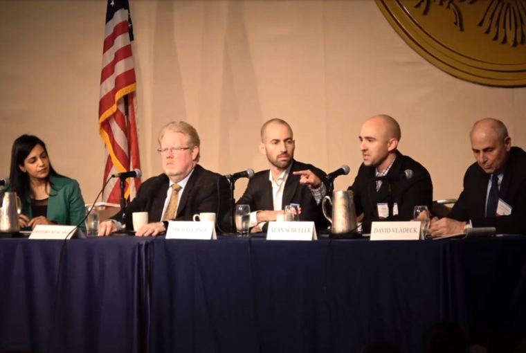 Photo of Lt. Col. Alan Schuller participating in a panel discussion