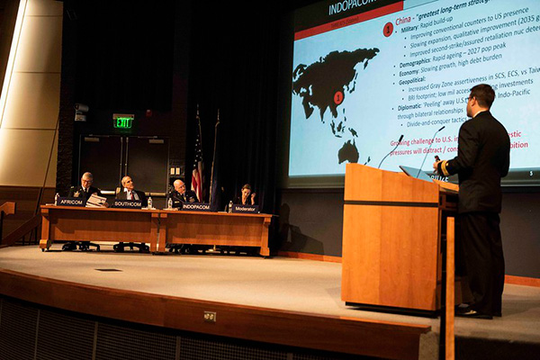 U.S. Naval War College students in the National Security Affairs Department participate in the Theater Security Decision Making (TSDM) Final Exercise in Spruance auditorium Nov. 6.