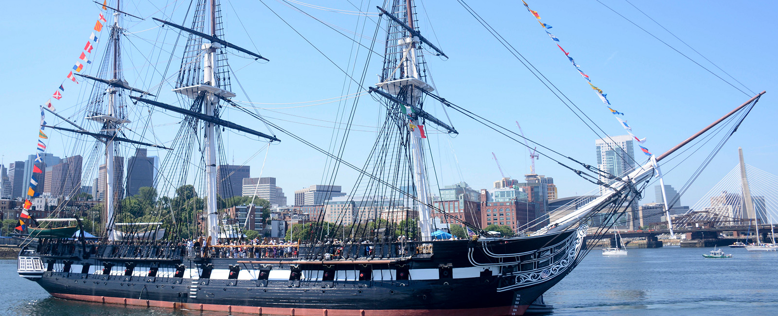 USS Constitution is tugged through Boston Harbor to Fort Independence on Castle Island during ‘Old Ironsides' underway commemorating Independence Day.