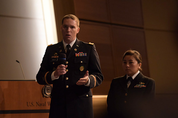 U.S. Naval War College students in the National Security Affairs department participate in the Theater Security Decision Making (TSDM) Final Exercise in Spruance auditorium Nov. 6.