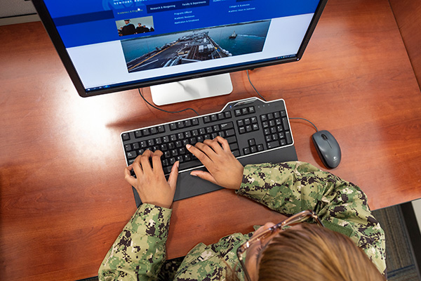 Student using a computer at the U.S. Naval War College