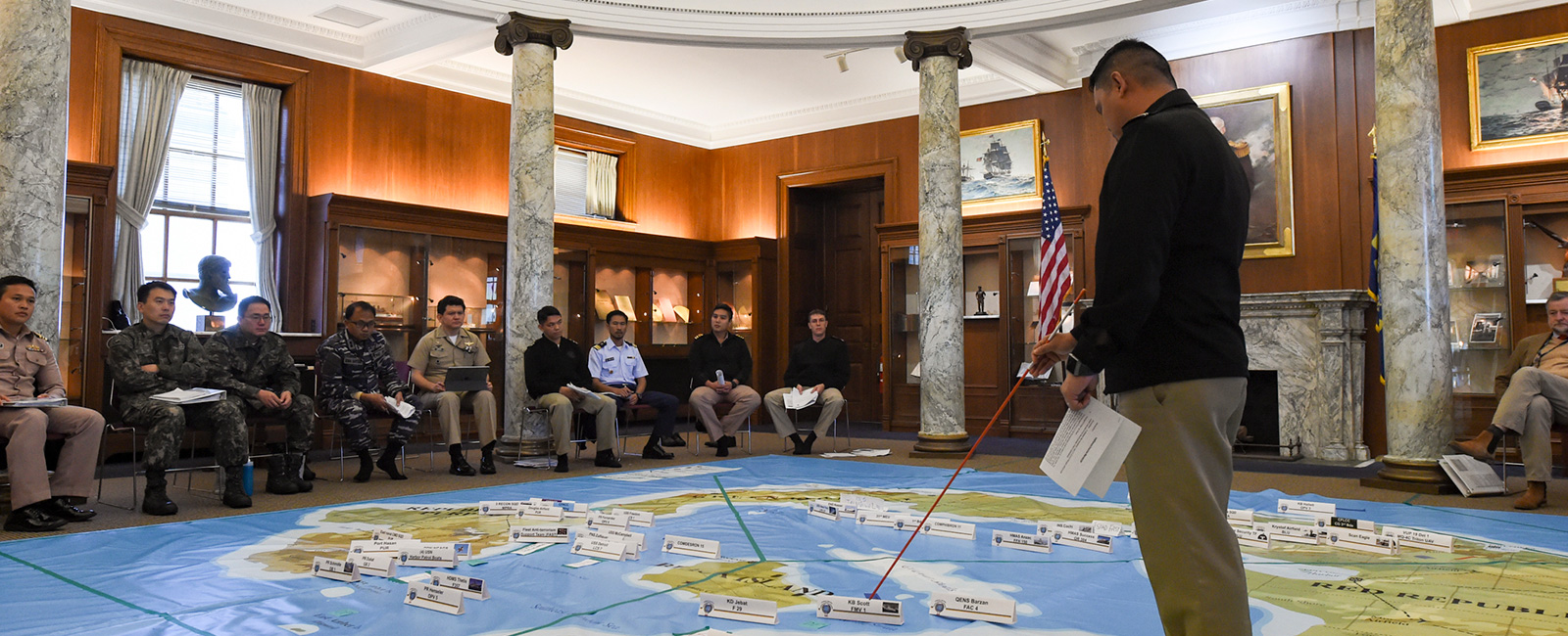 Philippine navy Lt. Arther Jefferson Layug, a U.S. Naval War College International Maritime Staff Operators Course (IMSOC) student, participates in a “Rehearsal of Concept” drill which refines the operational level plan the IMSOC students have developed in response to a fictitious scenario.