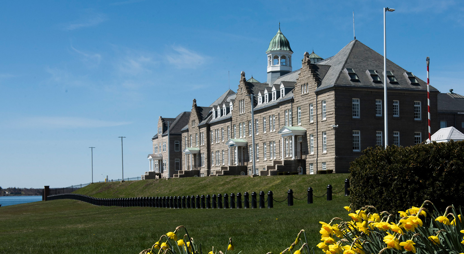 U.S. Naval War College's Luce Hall with tulips.